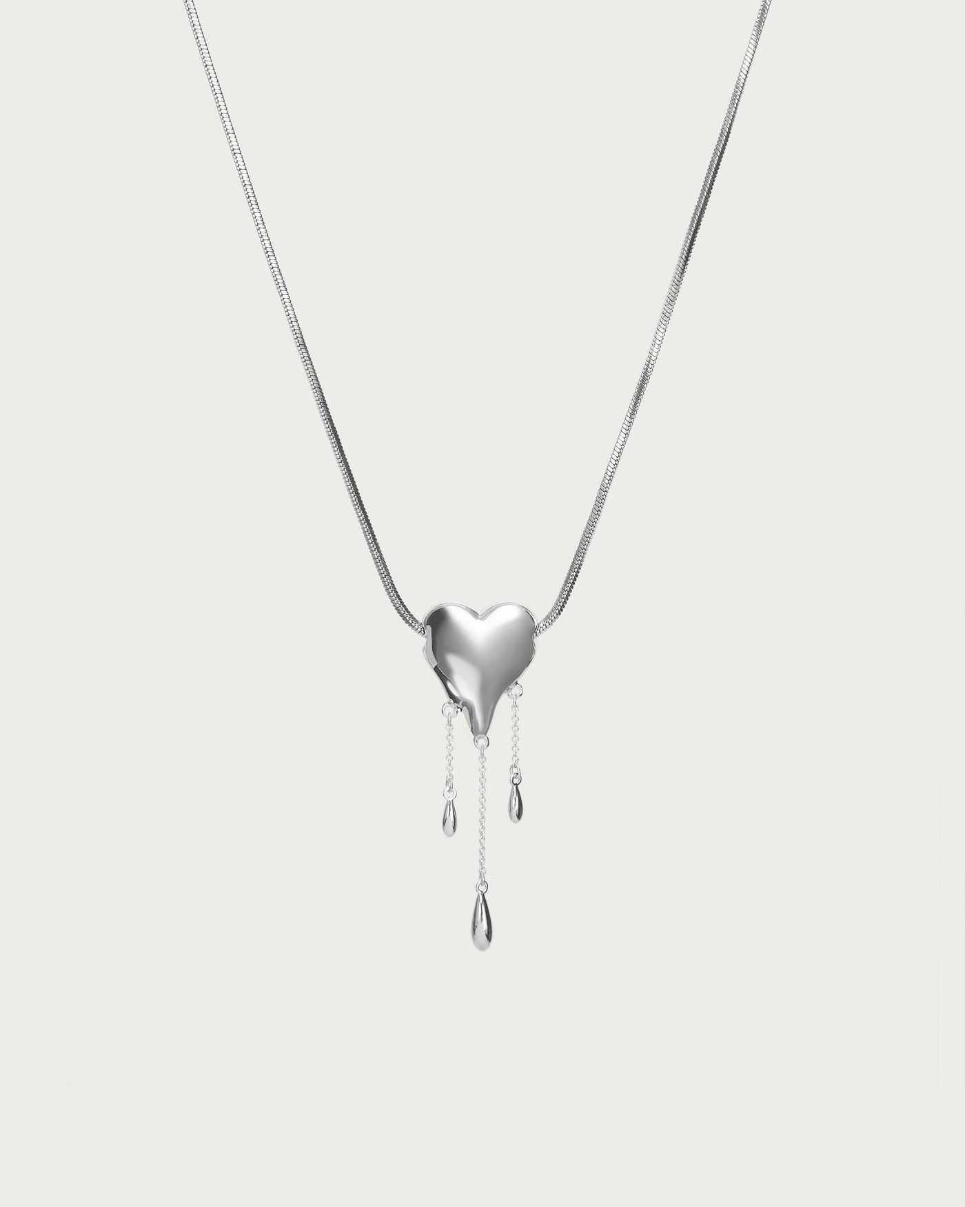 Venom’s Golden Drip Heart Necklace