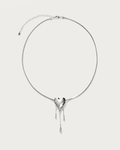 Venom’s Golden Drip Heart Necklace in Silver