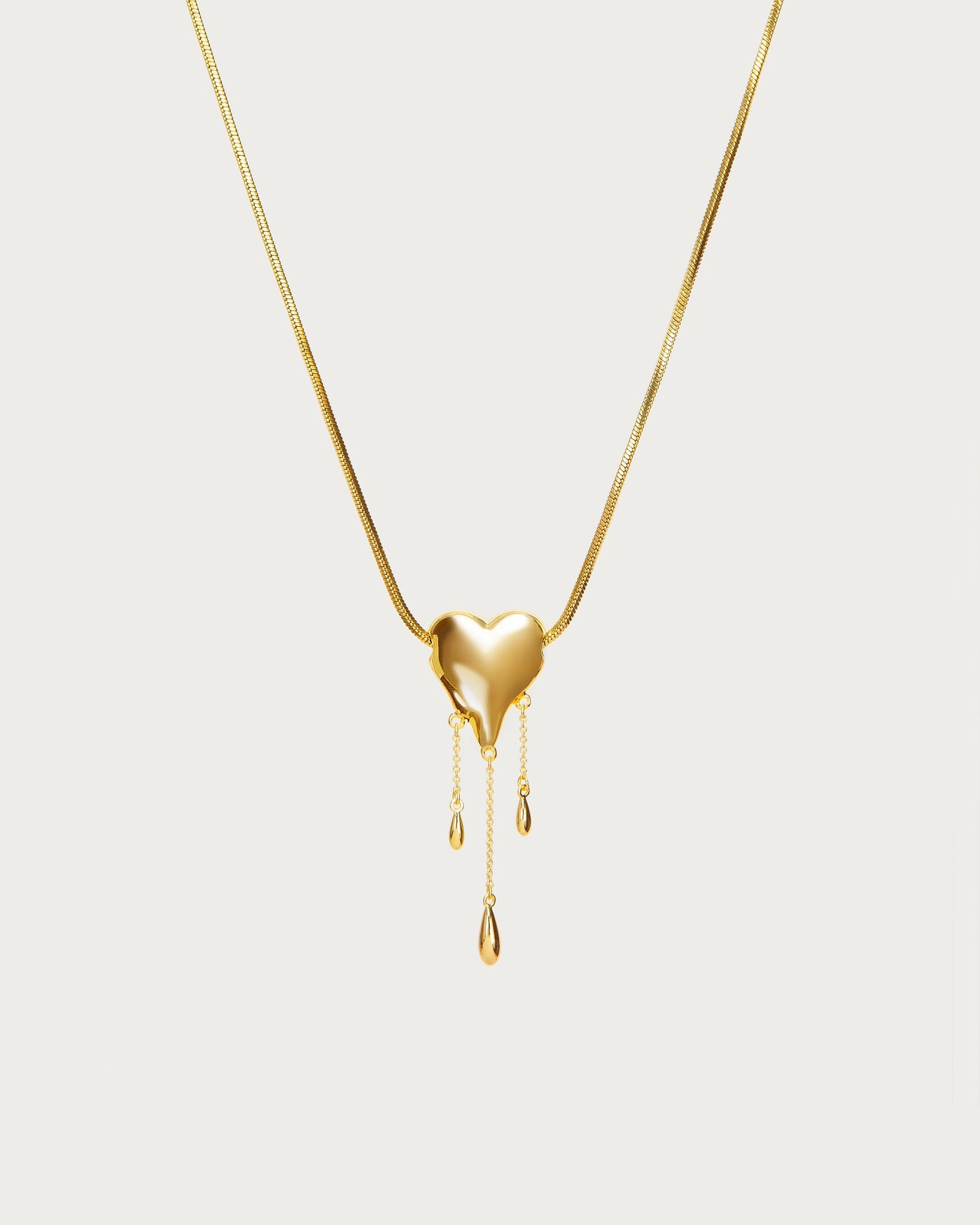 Venom’s Golden Drip Heart Necklace